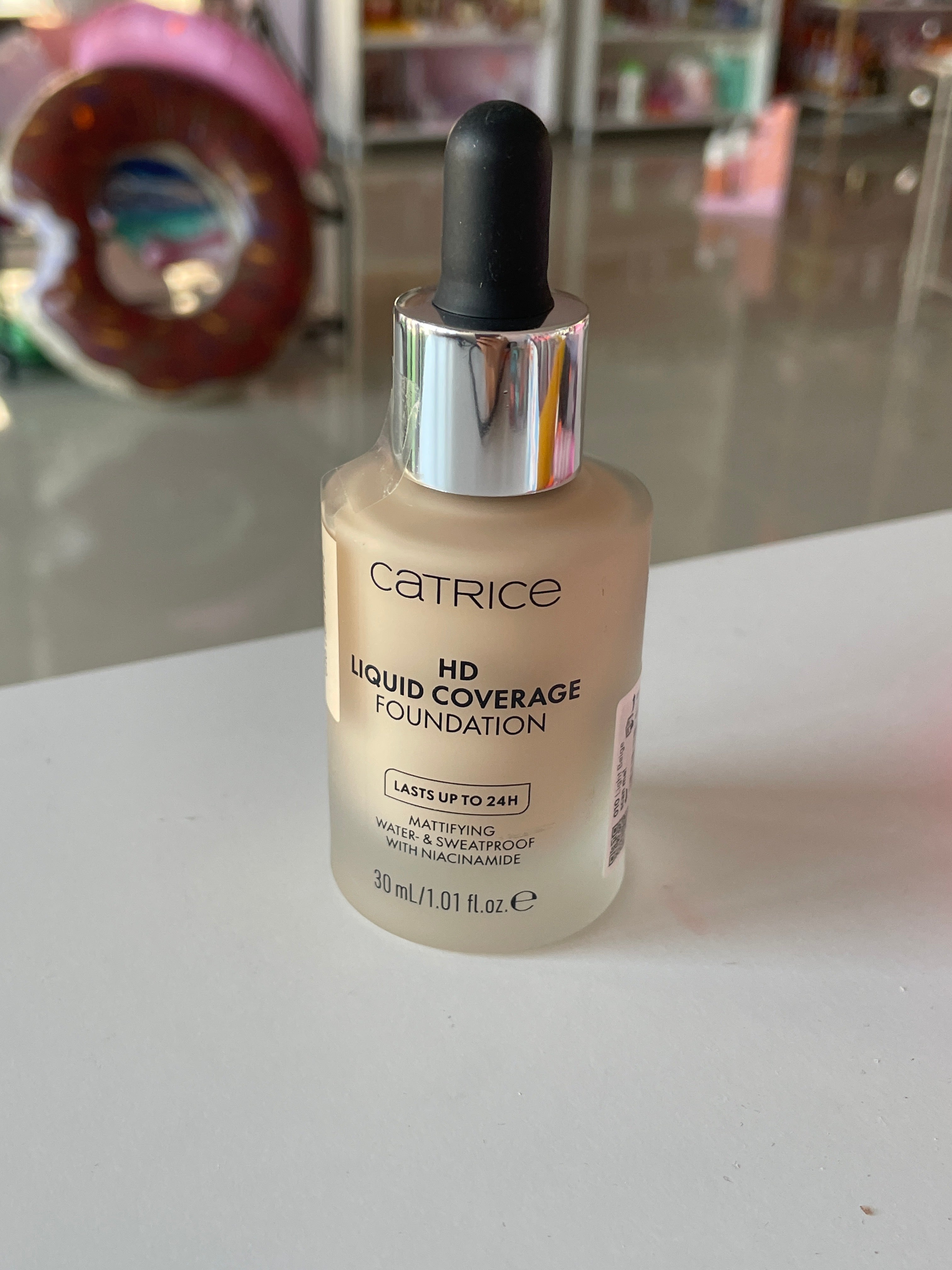 Fond de ten HD liquid coverage 010 Light Beige - CATRICE