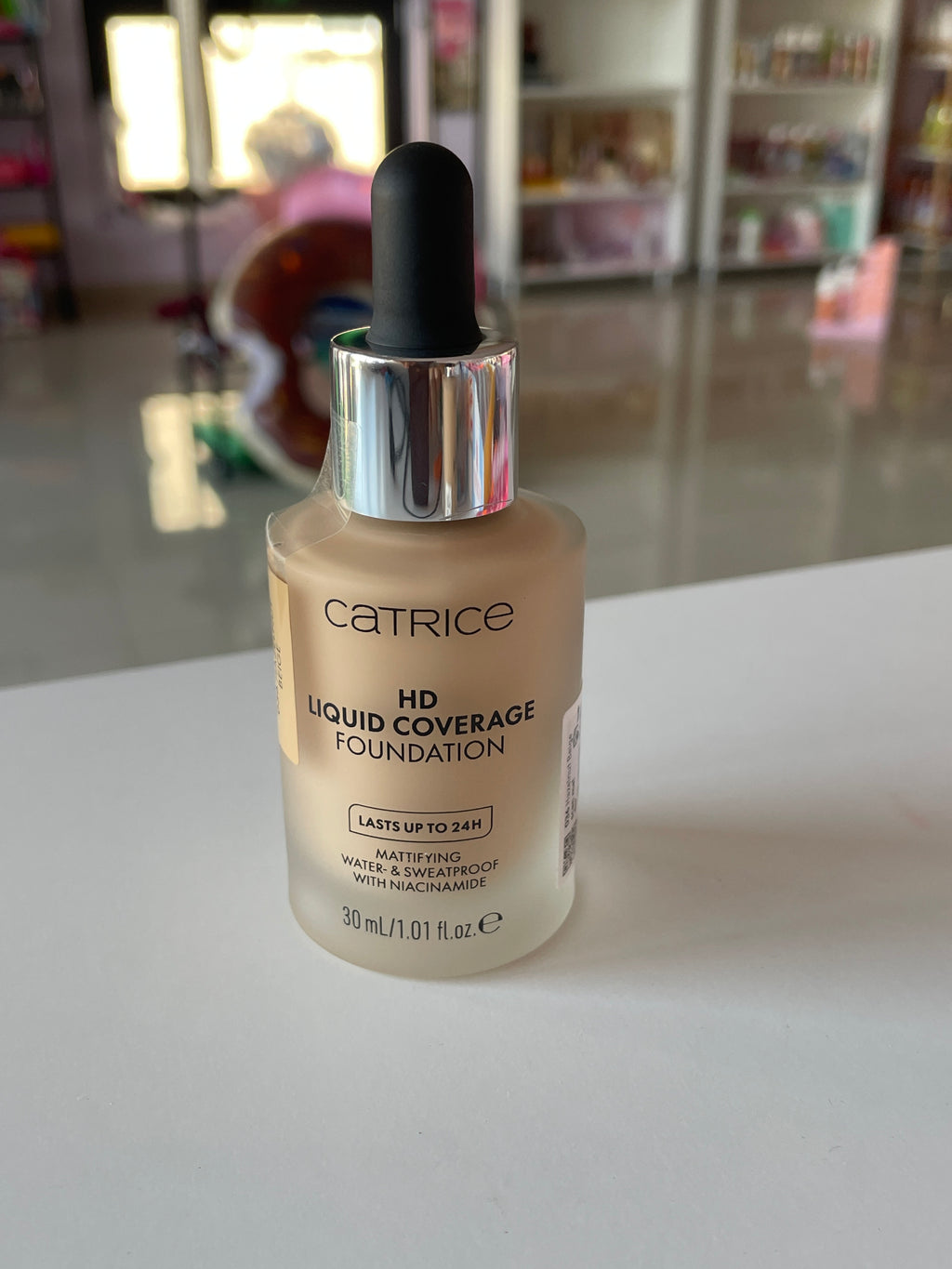 Fond de ten HD Liquid Coverage 036 Hazelnut Beige - CATRICE