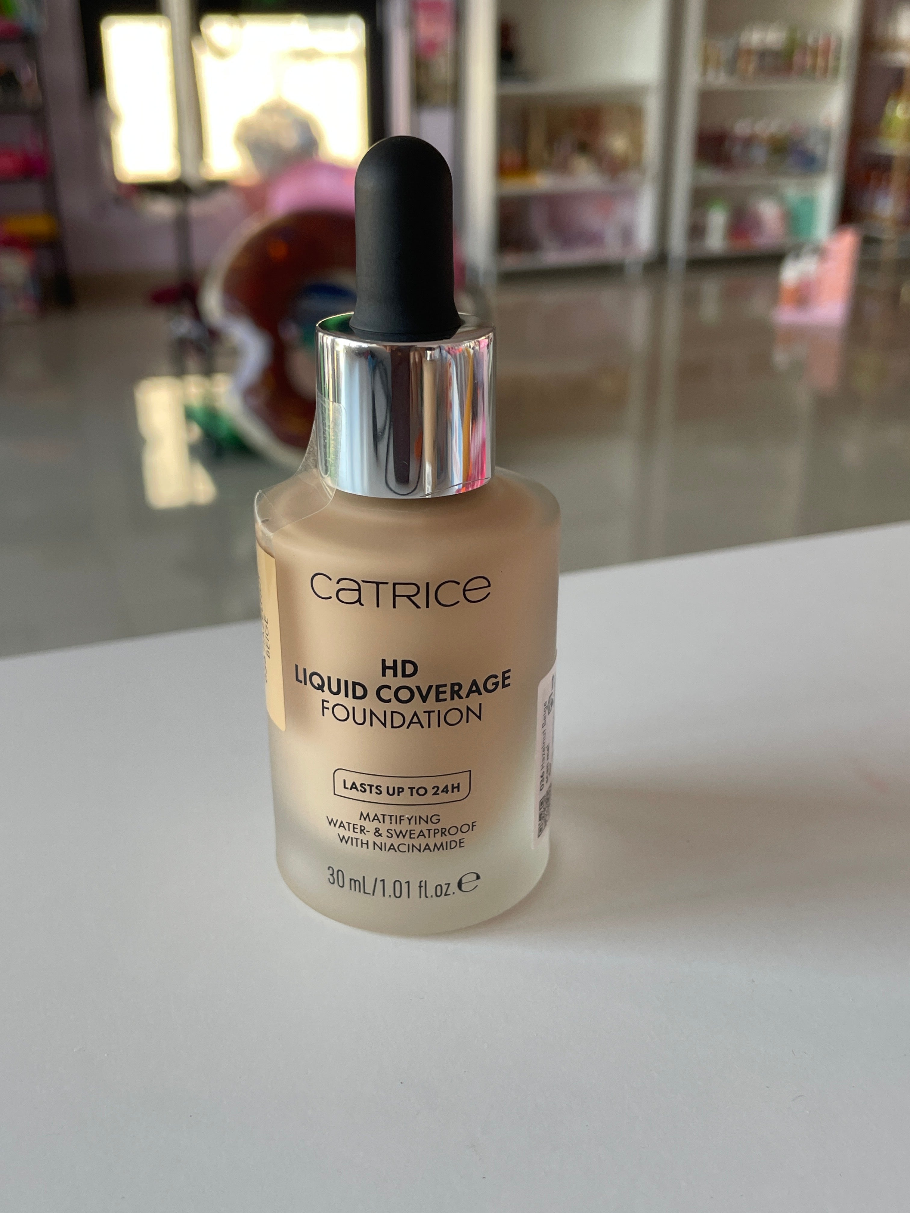 Fond de ten HD Liquid Coverage 036 Hazelnut Beige - CATRICE