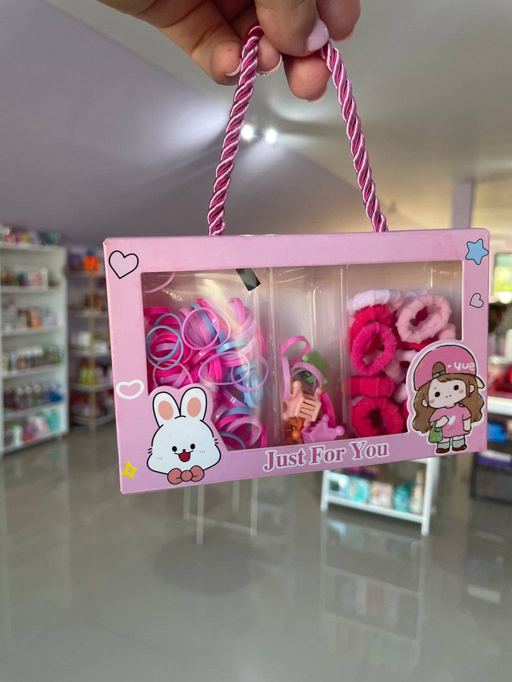 Gentuta cu accesorii pentru par